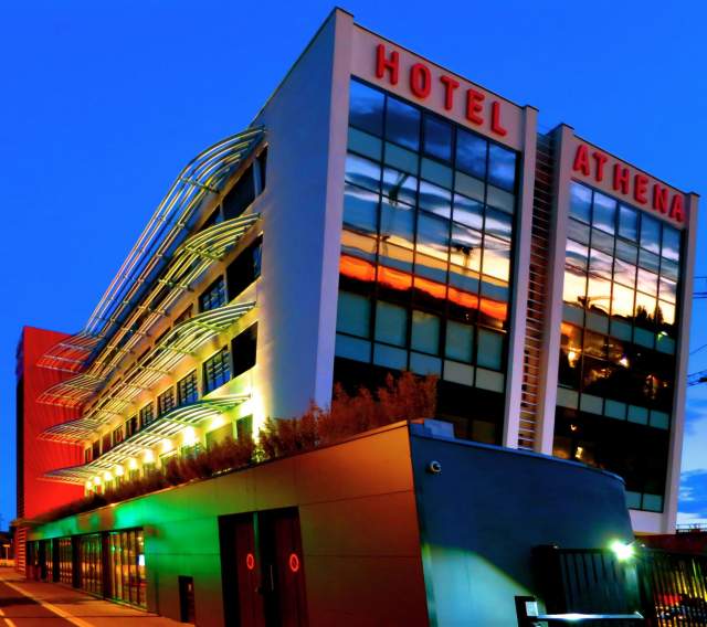 Nighttime facade of Hôtel Athena Spa in Strasbourg